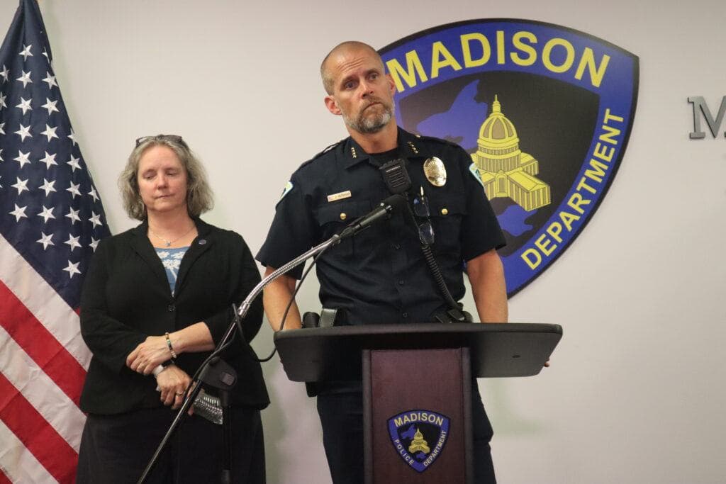 Madison police shooting briefing devolves into shouting match; hundreds of mourners gather for vigil
