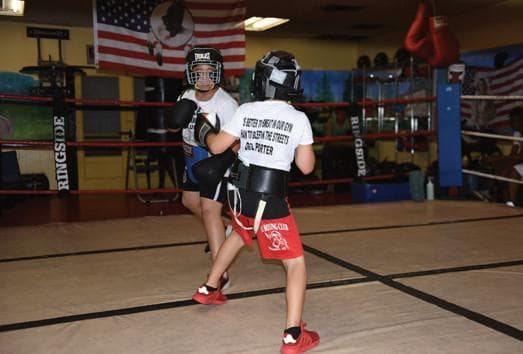 ‘Better to Sweat in the Gym than to Bleed in the Streets’: How Ace Boxing Club Keeps Youths on Right Track