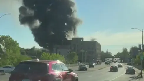 Hampton Avenue at 32nd Street could be closed two weeks after massive building fire; woman arrested