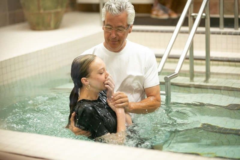 Baptism Highlights Second Day of Convention at Janesville Assembly Hall