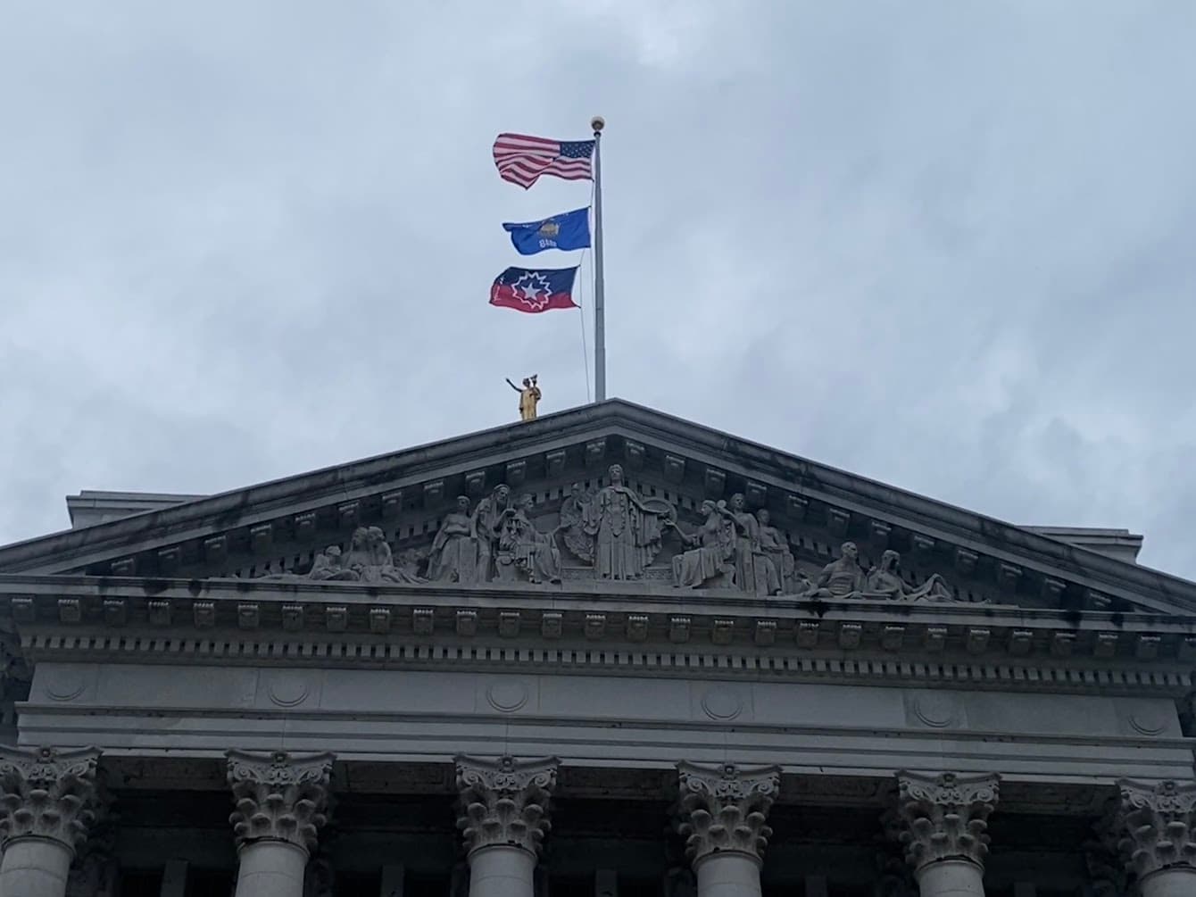 Governor Evers raises flag in honor of Juneteenth