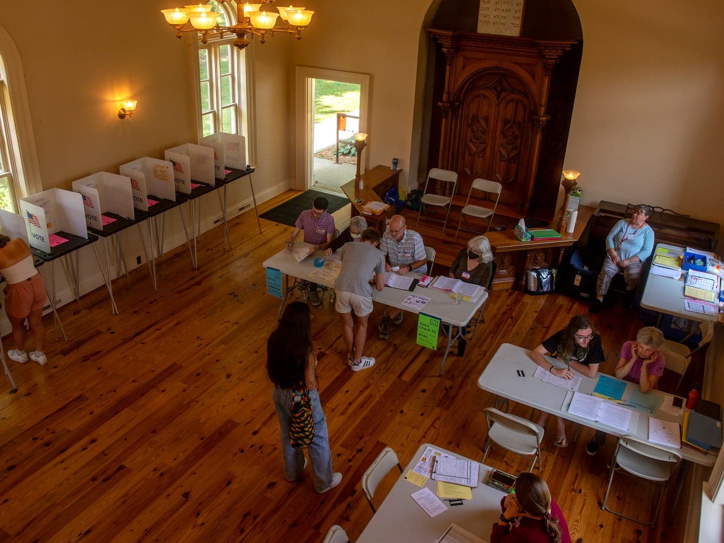 Gov. Evers disputes Madison’s argument that absentee voting is a privilege