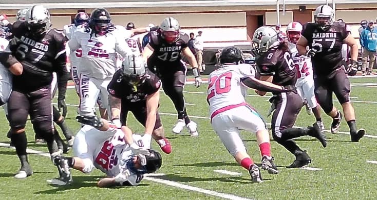 Racine Raiders dominate in MWUFL debut behind Carothers’ special-teams heroics