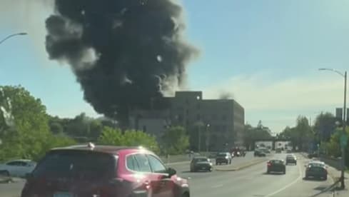 Hampton Avenue at 32nd Street could be closed two weeks after massive building fire; woman arrested