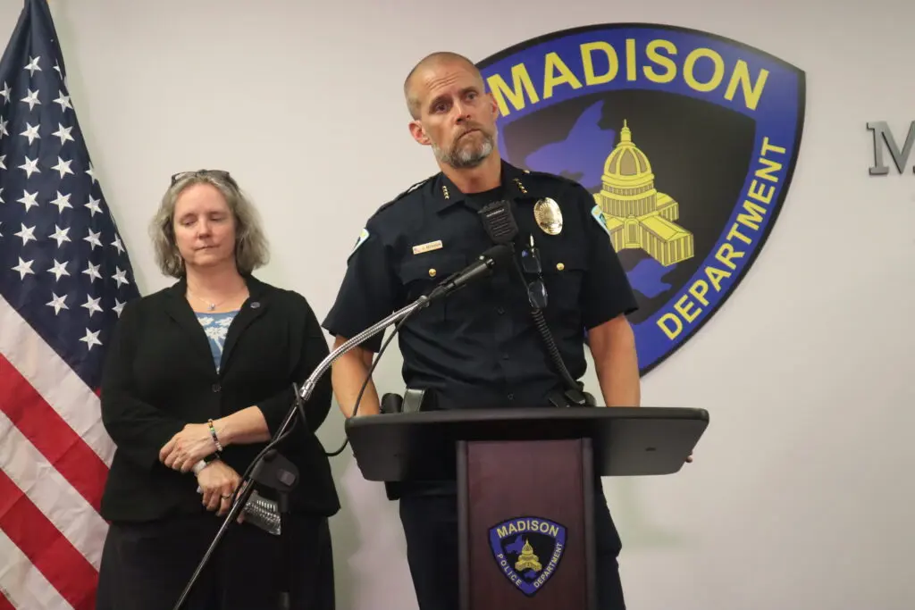 Madison police shooting briefing devolves into shouting match; hundreds of mourners gather for vigil